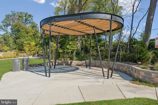 a view of a patio with a table and chairs