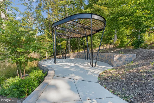 a view of a brick house with a yard