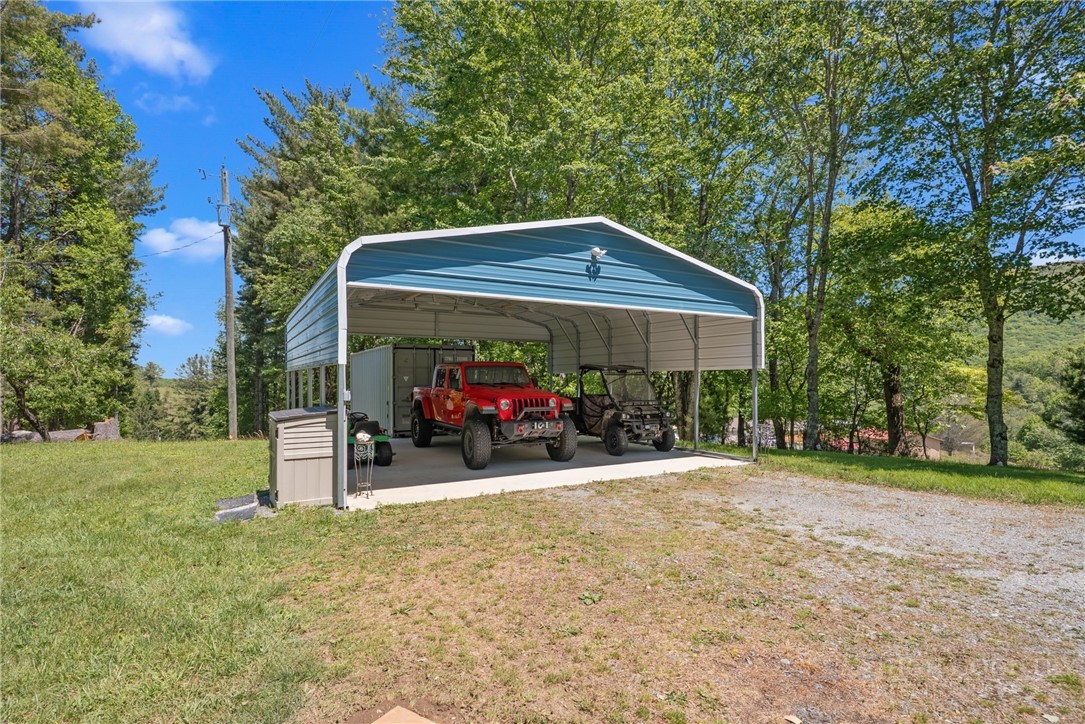154 Folger Road Sparta, NC 28675 - Photo 22 of 37 a view of a car park in front of a house