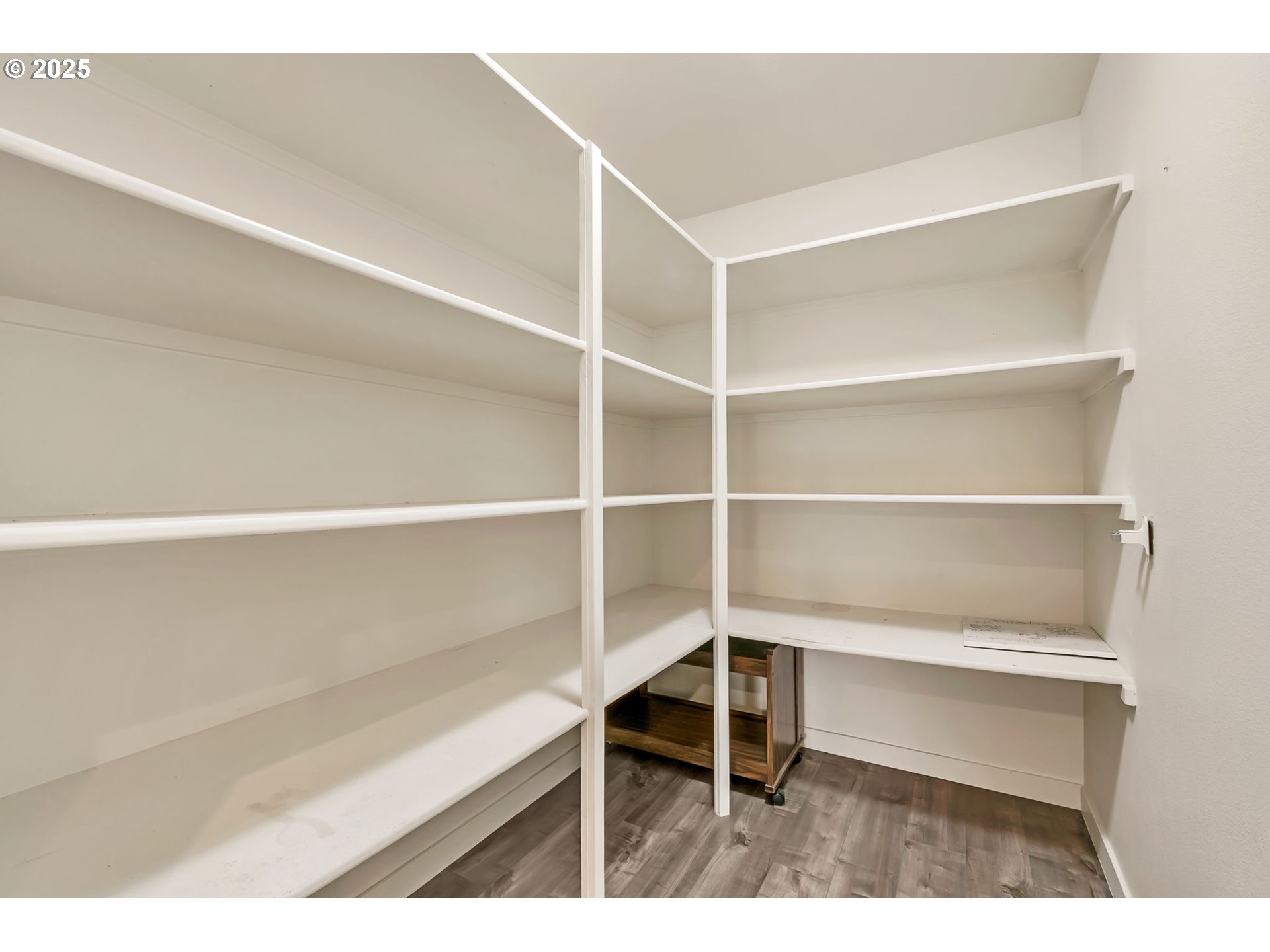 3869 Gusty Avenue Northeast Albany, OR 97322 - Photo 19 of 47 a wooden floor with a book shelf