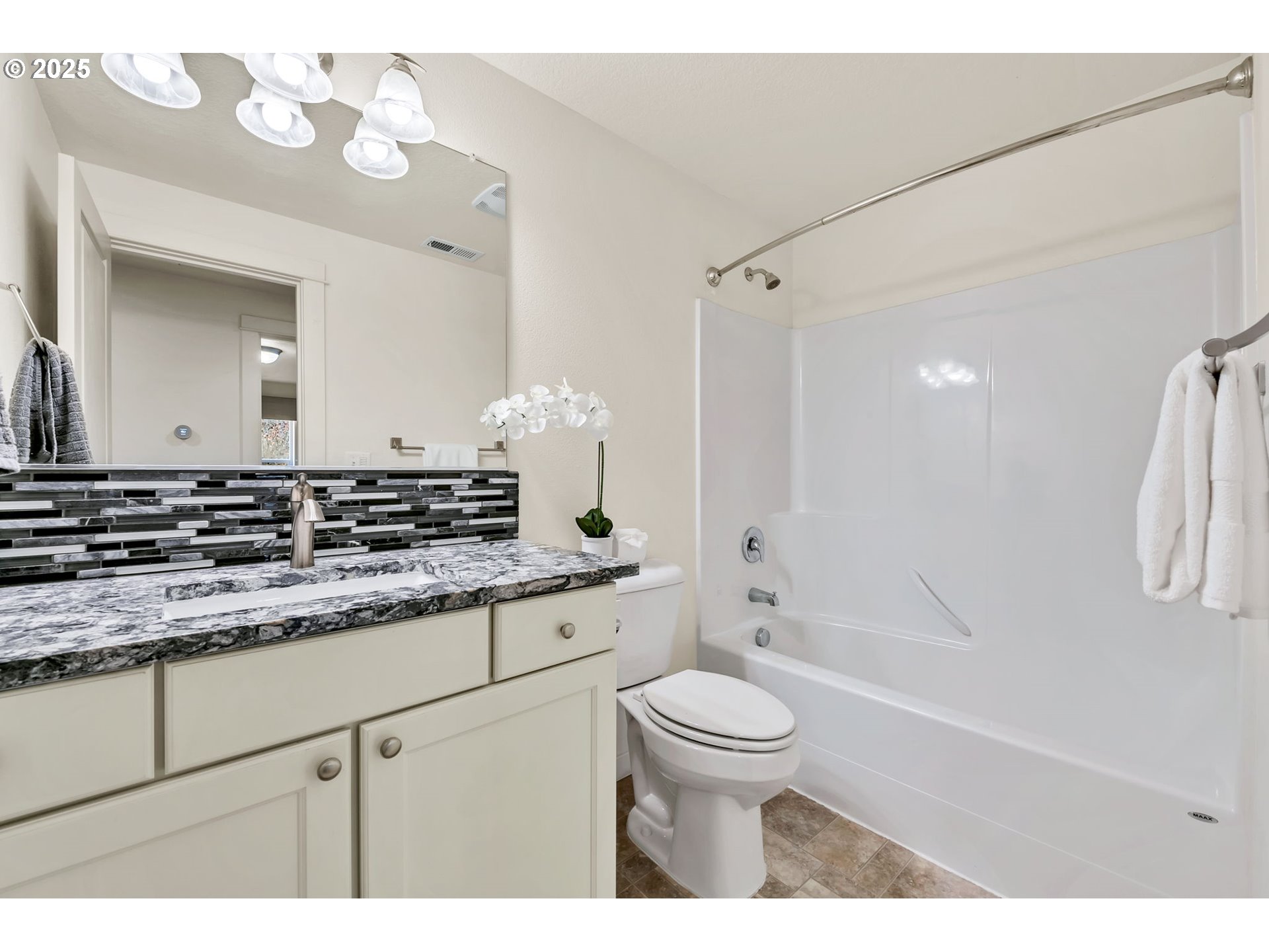 3869 Gusty Avenue Northeast Albany, OR 97322 - Photo 23 of 47 a bathroom with a granite countertop sink a toilet and shower