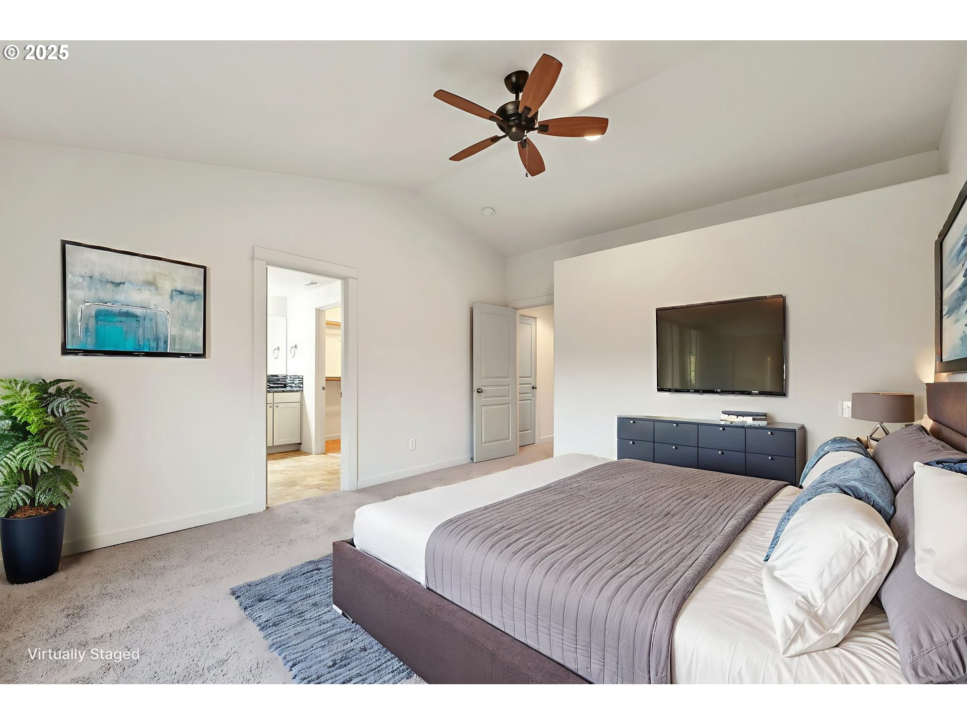 3869 Gusty Avenue Northeast Albany, OR 97322 - Photo 32 of 47 a bedroom with a bed and a flat screen tv