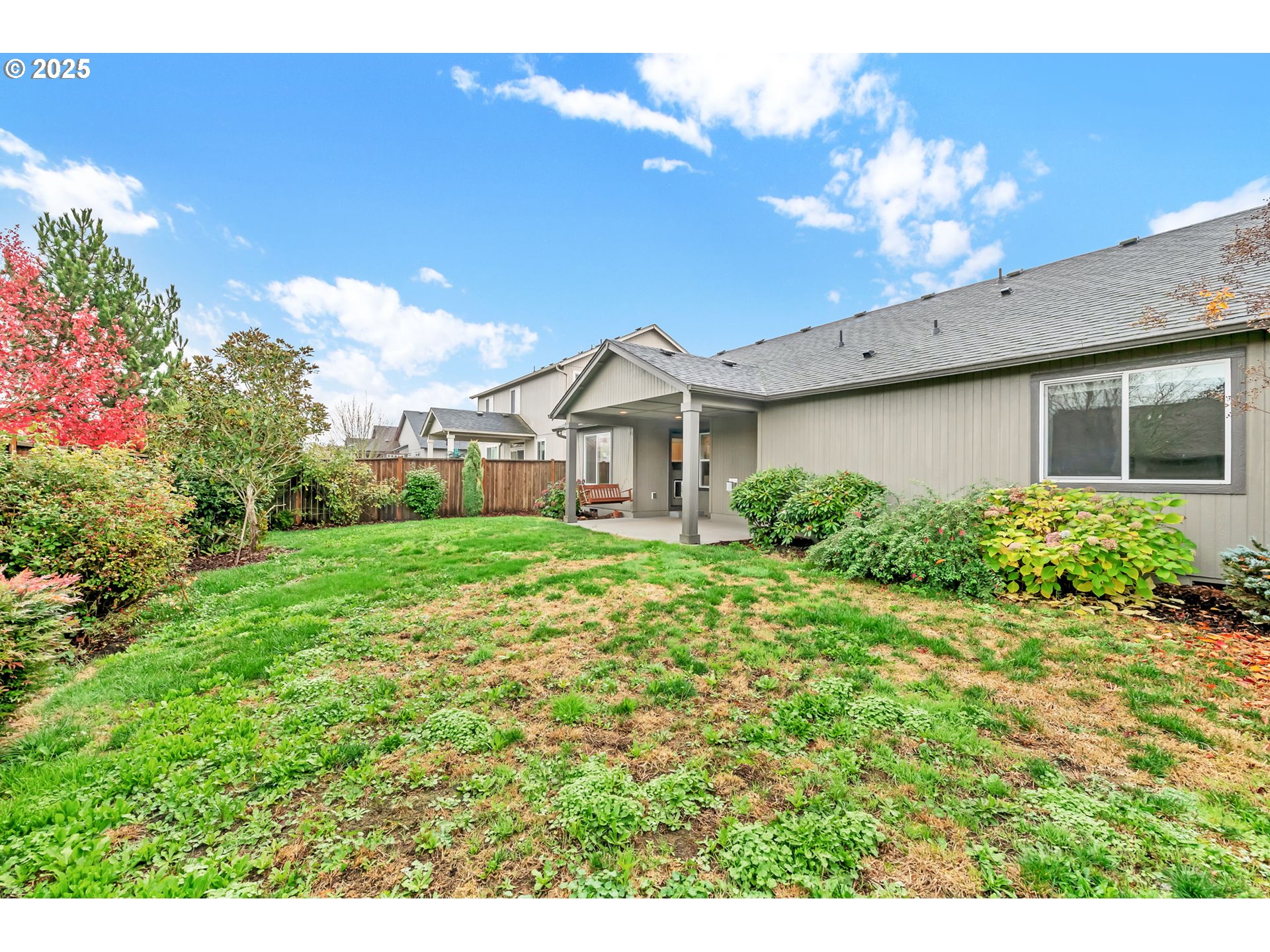 3869 Gusty Avenue Northeast Albany, OR 97322 - Photo 41 of 47 a view of a white house with a big yard and potted plants