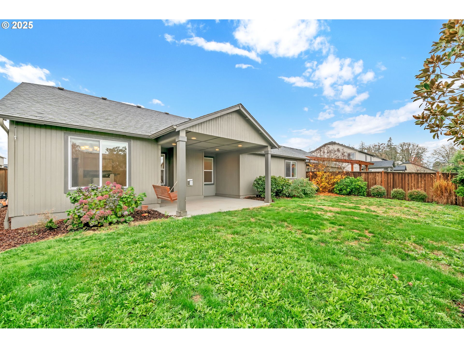 3869 Gusty Avenue Northeast Albany, OR 97322 - Photo 44 of 47 a front view of a house with garden