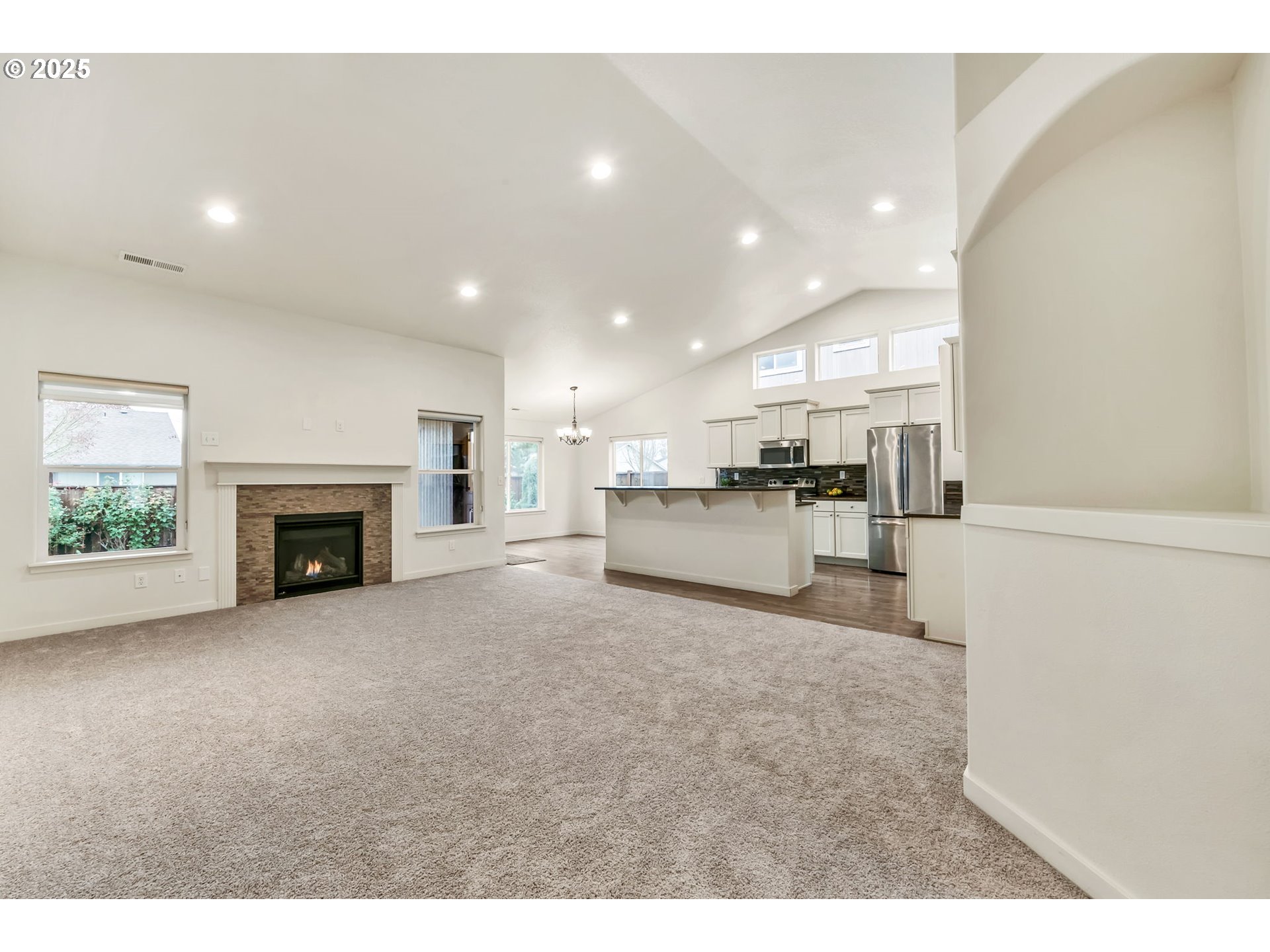 3869 Gusty Avenue Northeast Albany, OR 97322 - Photo 45 of 47 a view of open kitchen with a sink oven cabinets and a kitchen