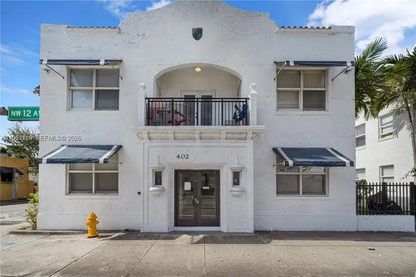 a front view of a house with a garage