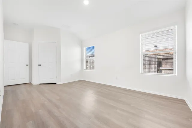 a view of an empty walk in closet