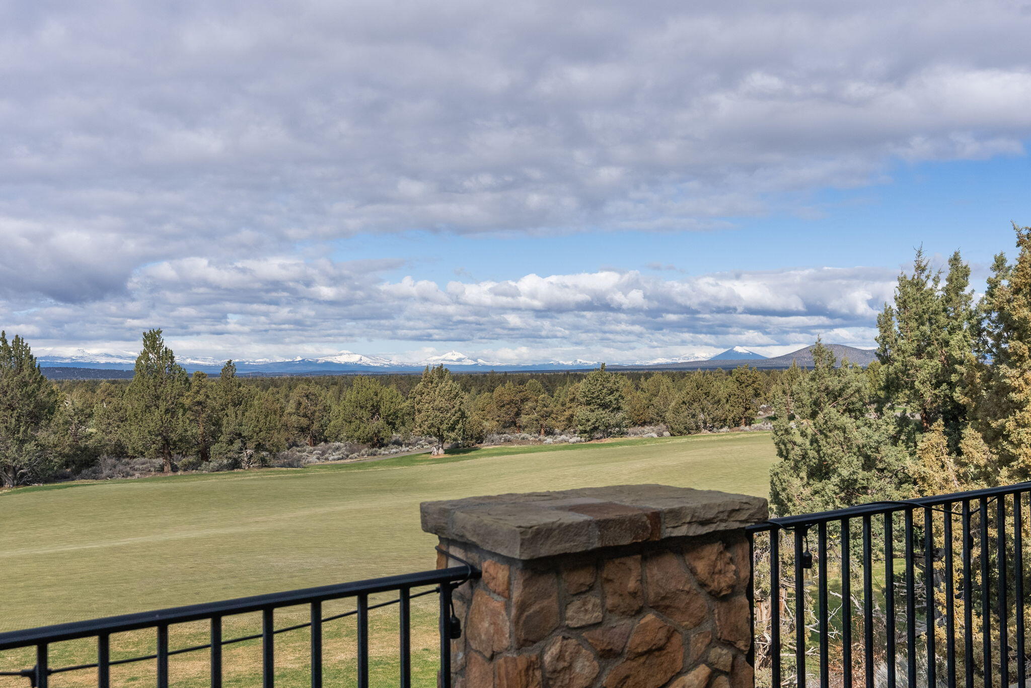 22887 Ghost Tree Lane Bend, OR 97701 - Photo 56 of 97 Primary bedroom's private balcony to enjoy the expansive Cascade Mountian Views and Fazio fairway.