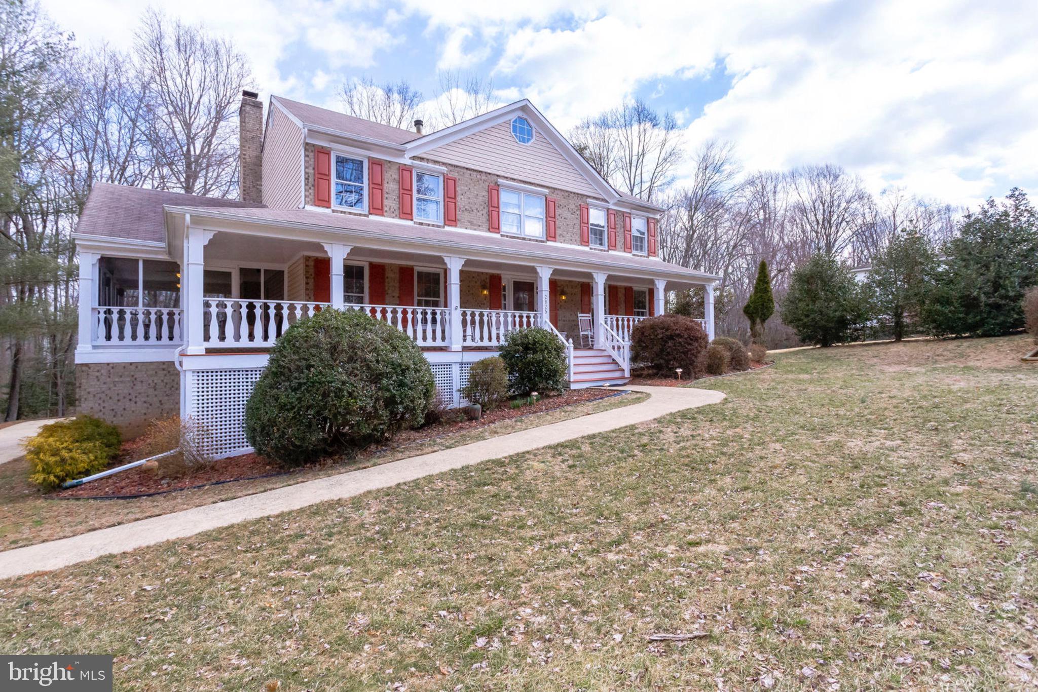 2825 Rifle Ridge Road Oakton, VA 22124 - Photo 2 of 53 Wrap-around & screened-in porch