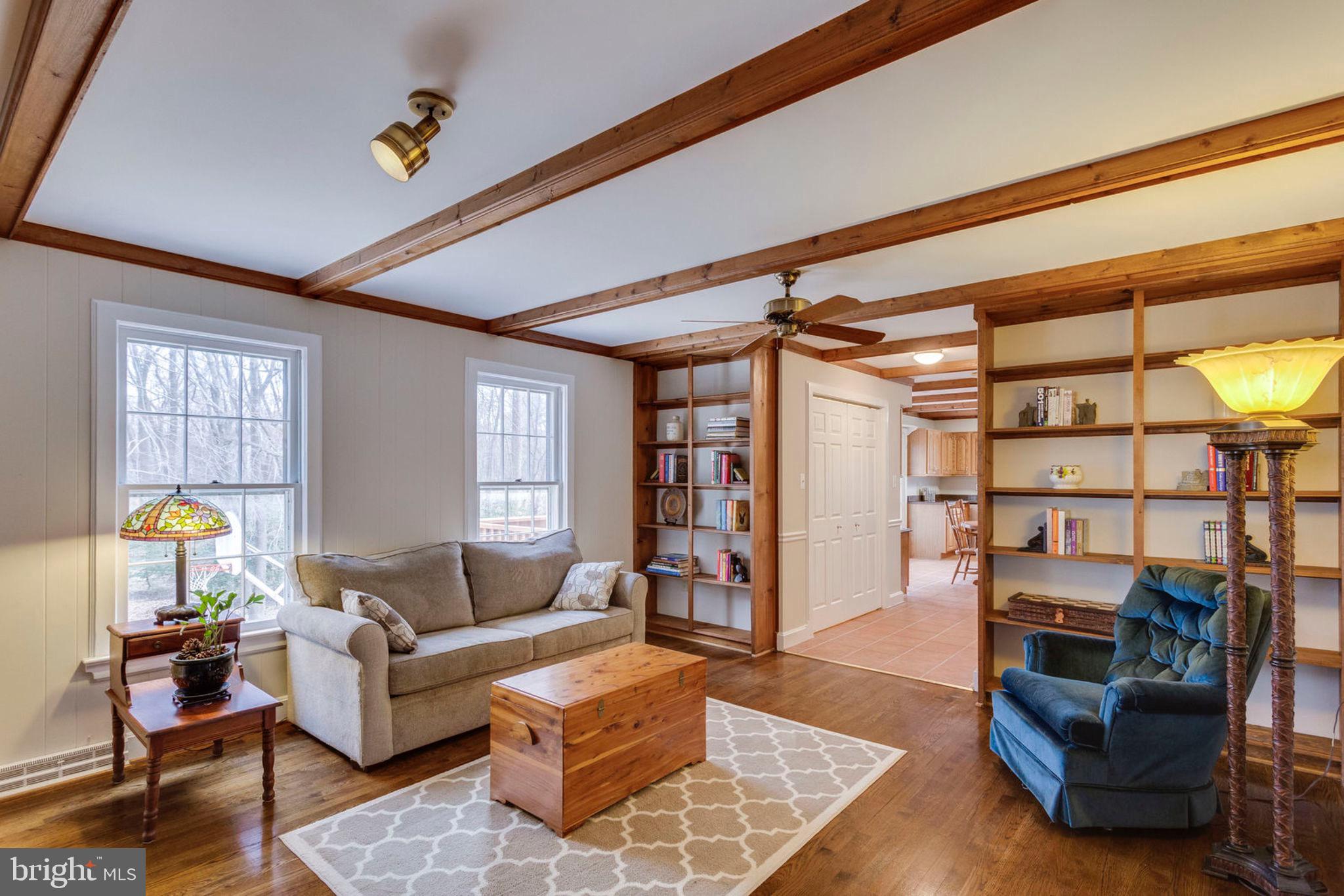 2825 Rifle Ridge Road Oakton, VA 22124 - Photo 15 of 53 Gleaming wood beams, hardwood floors and built-ins