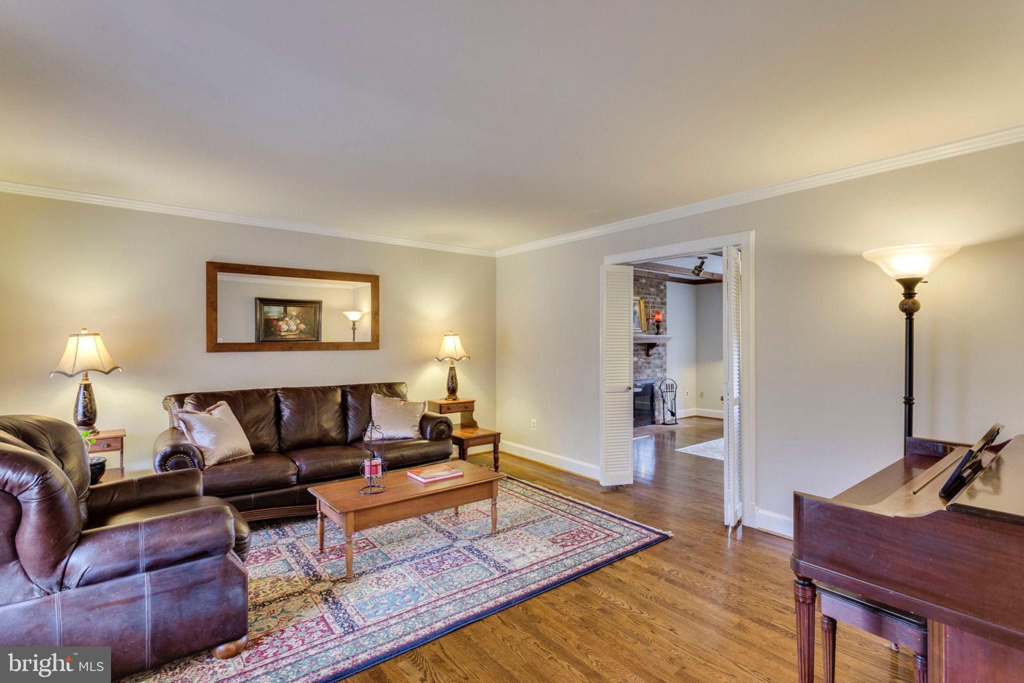 2825 Rifle Ridge Road Oakton, VA 22124 - Photo 20 of 53 Gleaming hardwood floors in living room