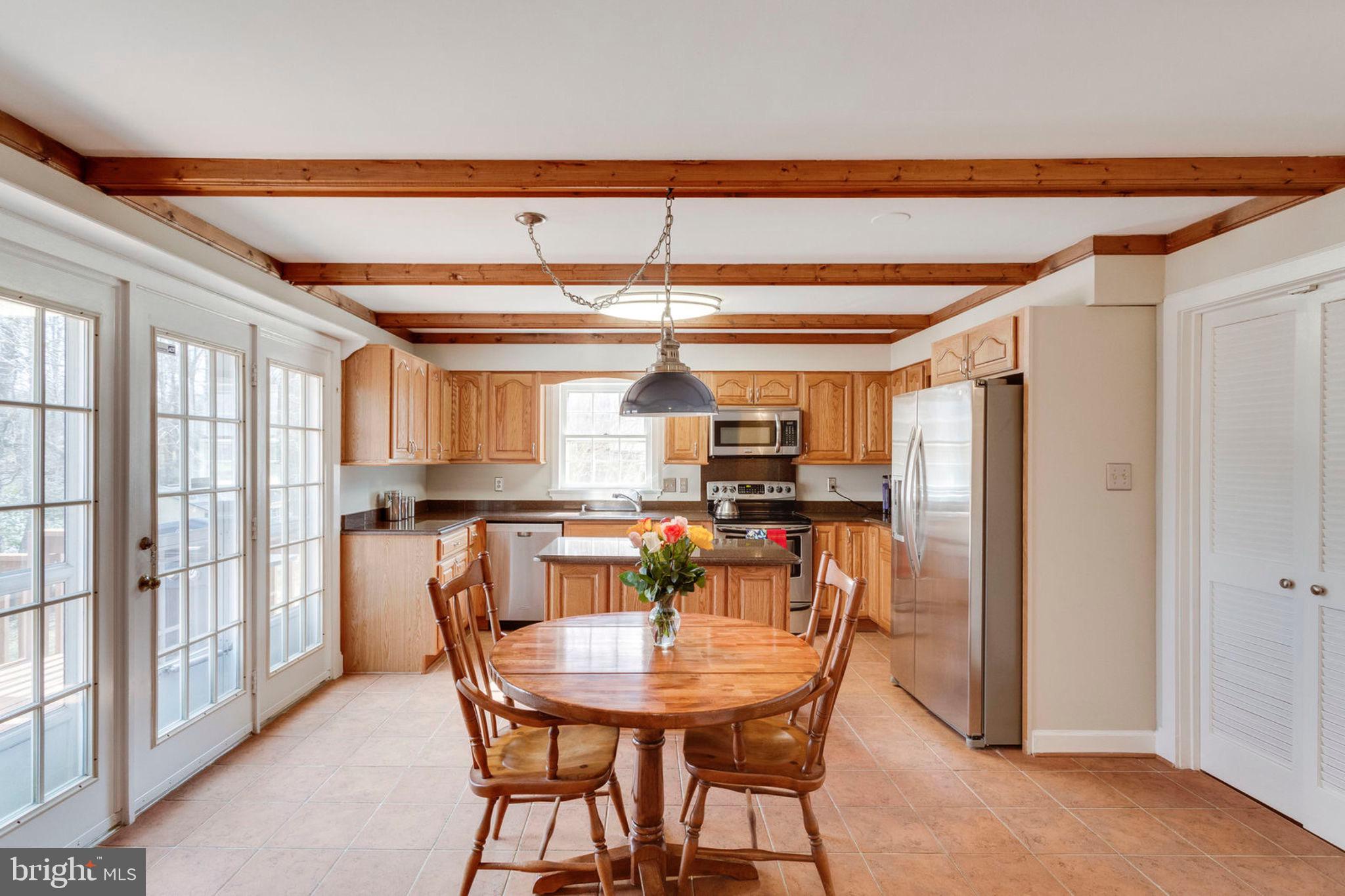 2825 Rifle Ridge Road Oakton, VA 22124 - Photo 9 of 53 Gleaming wood beams and steps away from your deck