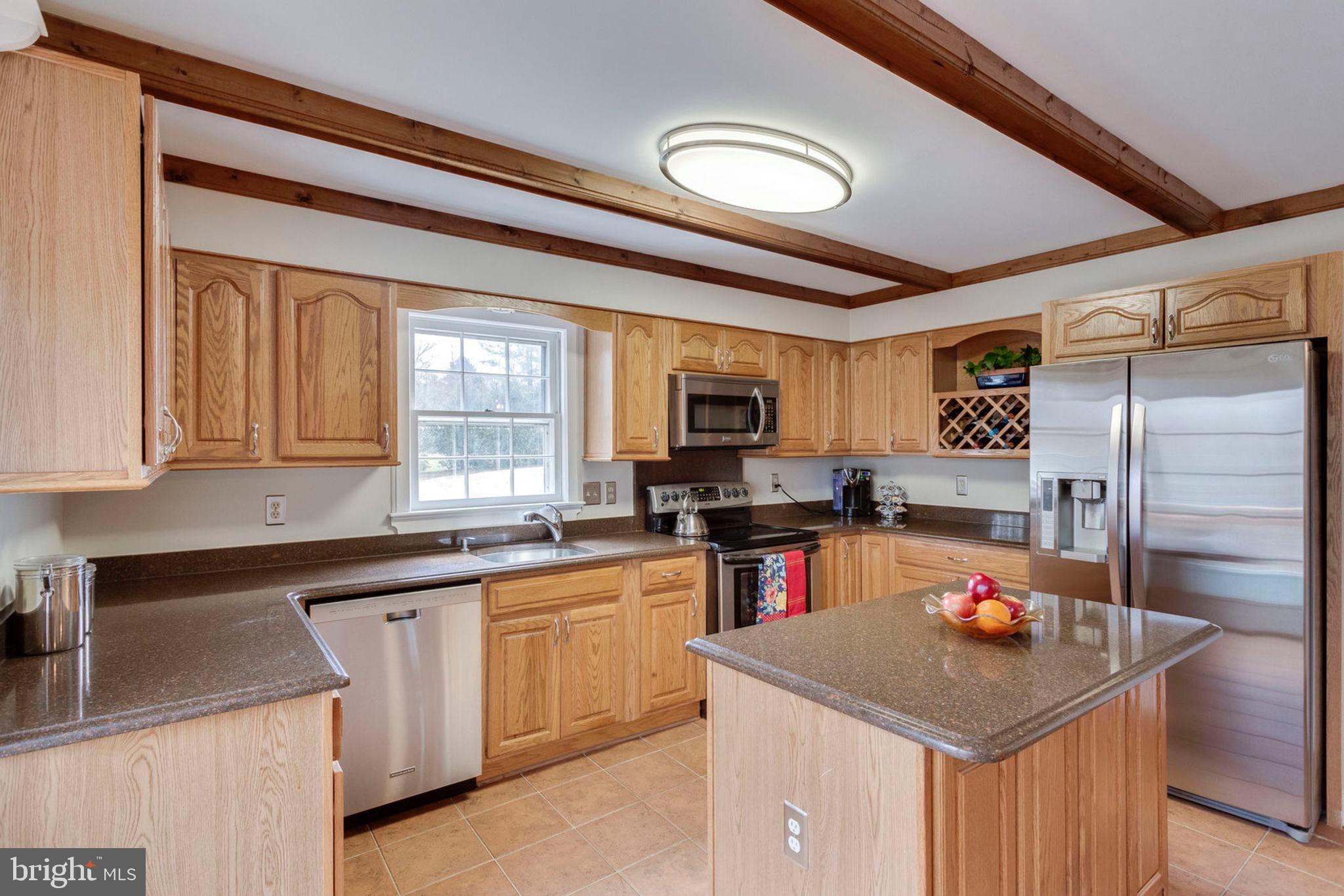 2825 Rifle Ridge Road Oakton, VA 22124 - Photo 10 of 53 Granite countertops and stainless steel appliances