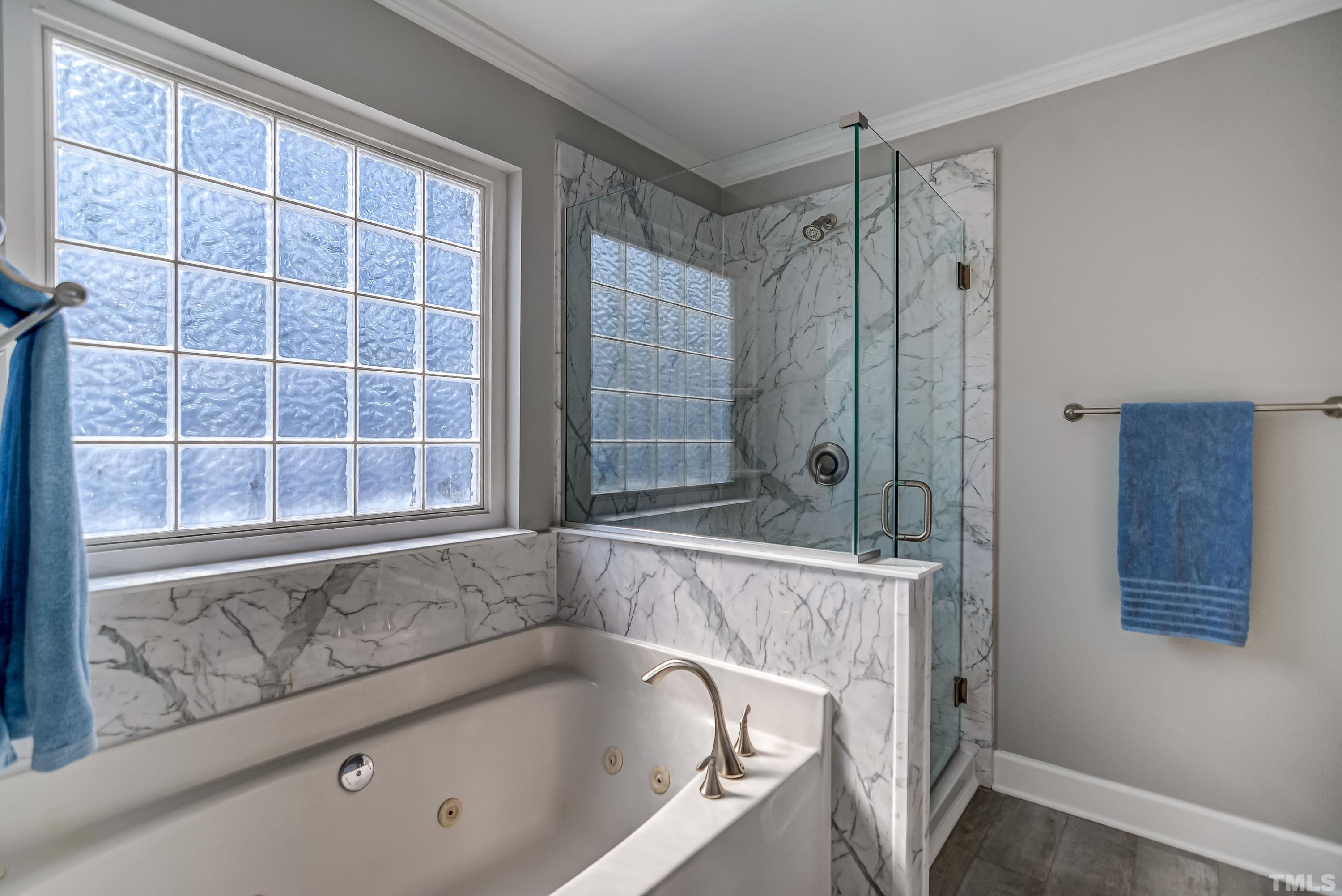 5424 Neuse Forest Road Raleigh, NC 27616 - Photo 19 of 30 a bathroom with a granite countertop bathtub and shower