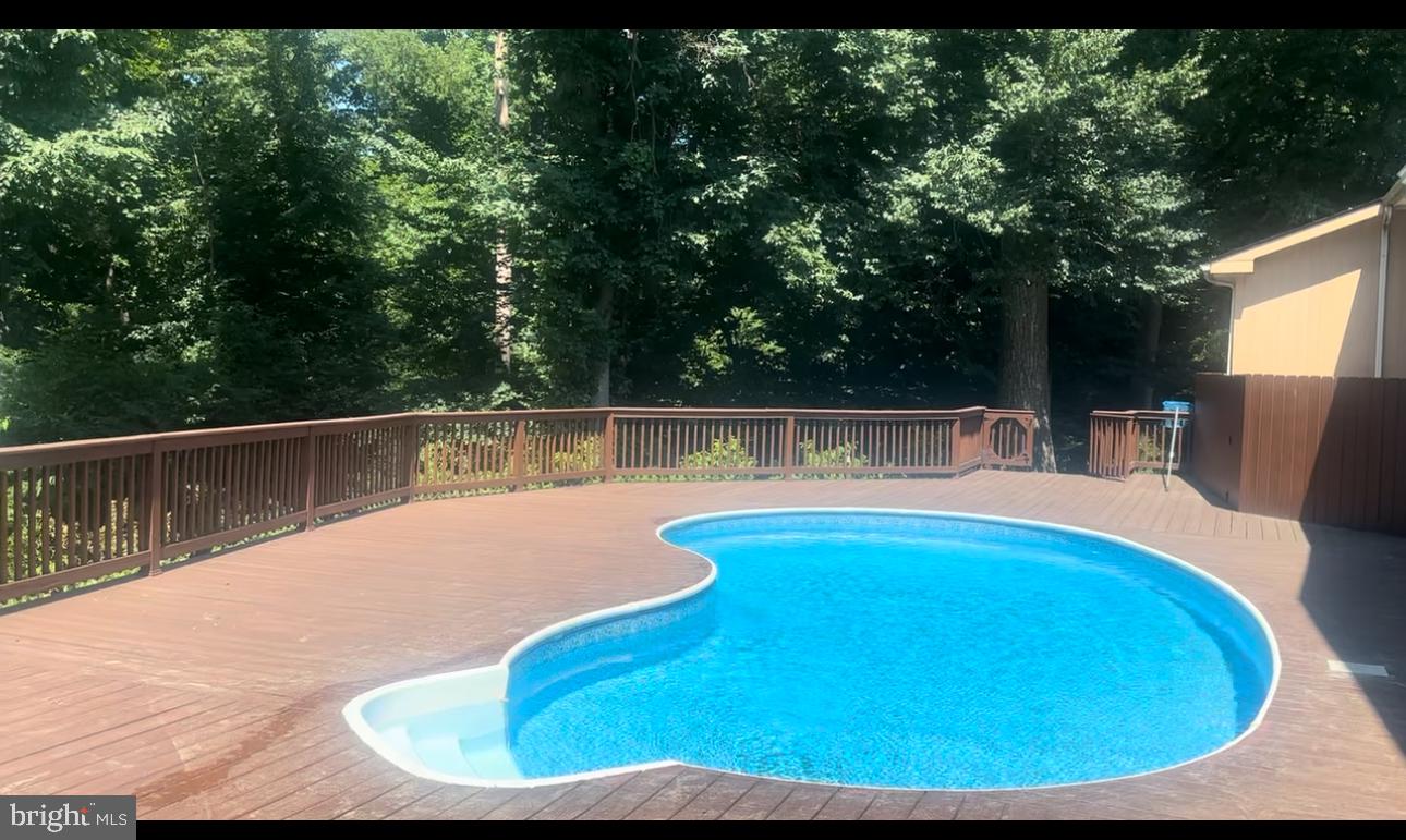 1343 Bohemia Mill Road Middletown, DE 19709 - Photo 5 of 20 a view of a swimming pool with a patio