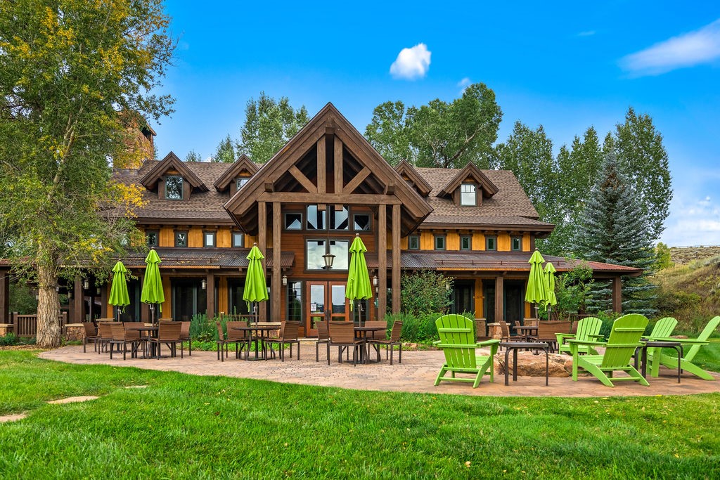 27095 Fire Song Road Steamboat Springs, CO 80487 - Photo 11 of 39 a view of a cafe with a table and chairs