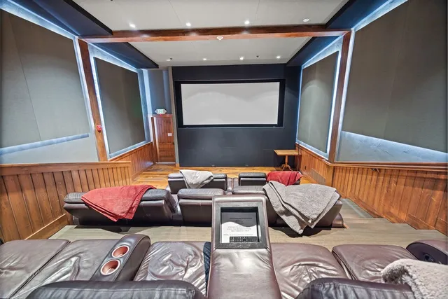 an aerial view of a house with garden space and outdoor seating