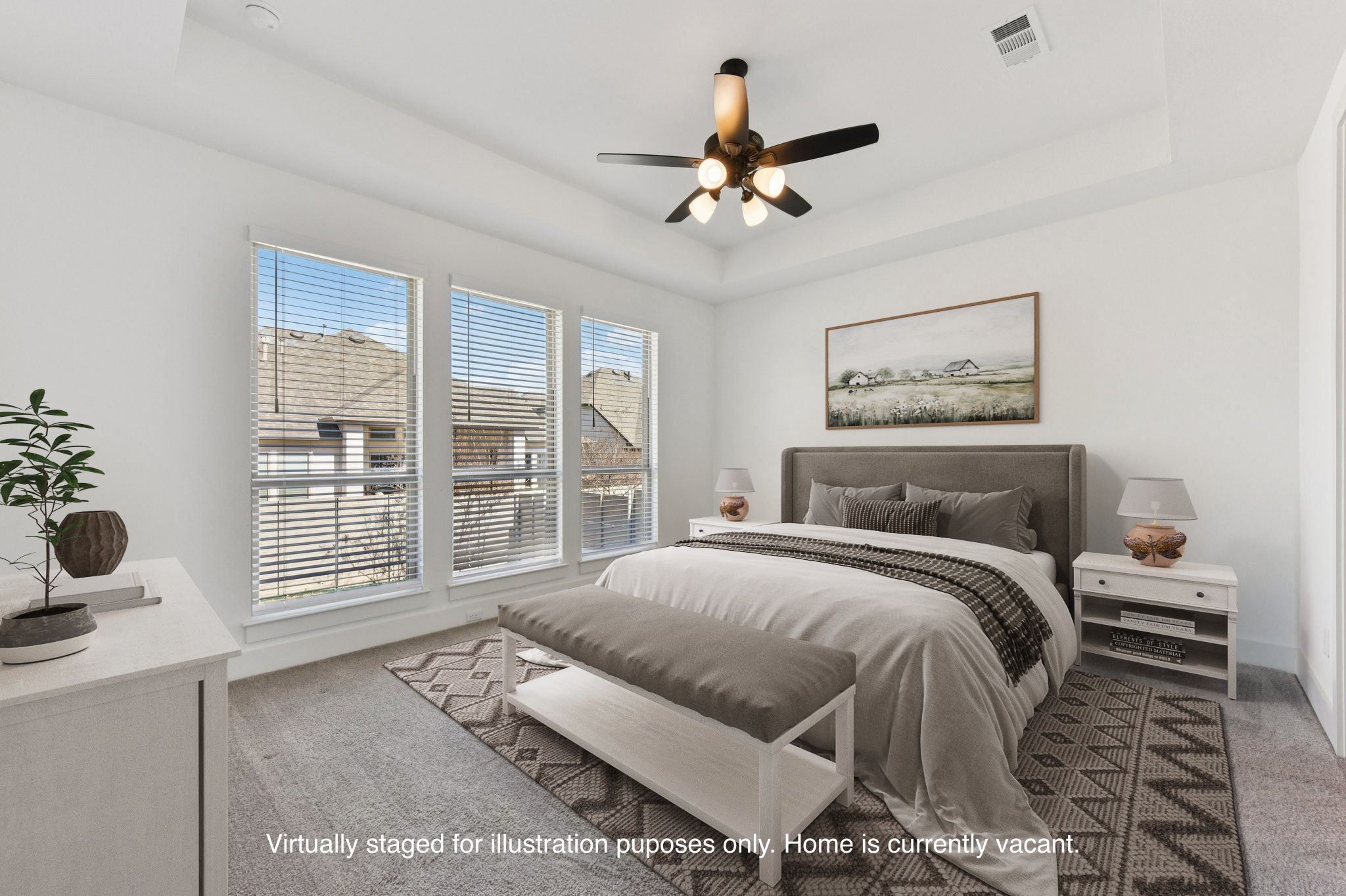 225 Ashmore Lane Georgetown, TX 78628 - Photo 11 of 36 Main floor primary bedroom large enough for your king size bed. Love the tray ceiling, ceiling fan and large picture windows (Virtually staged for illustration purposes only)
