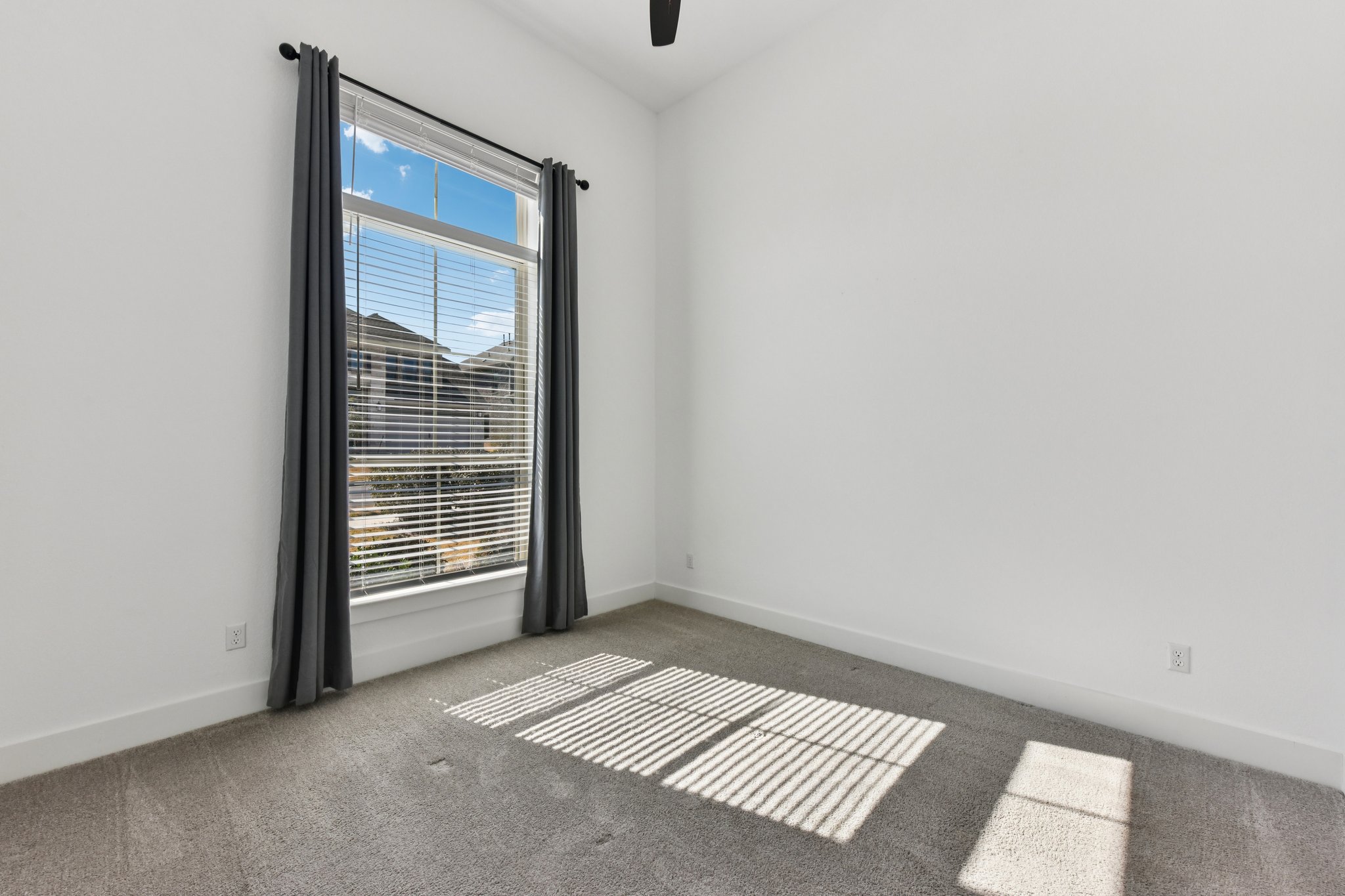 225 Ashmore Lane Georgetown, TX 78628 - Photo 17 of 36 MAIN FLOOR Bedroom is perfect for multi-gen families or extended stay guests with an ensuite full bathroom. A little bit of privacy for guests.