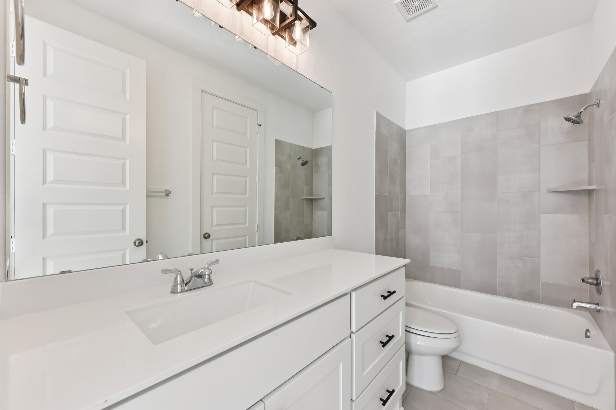 225 Ashmore Lane Georgetown, TX 78628 - Photo 18 of 36 Luxurious and comfortable ensuite bathroom to the main floor guest room. Your guests will love coming to visit!