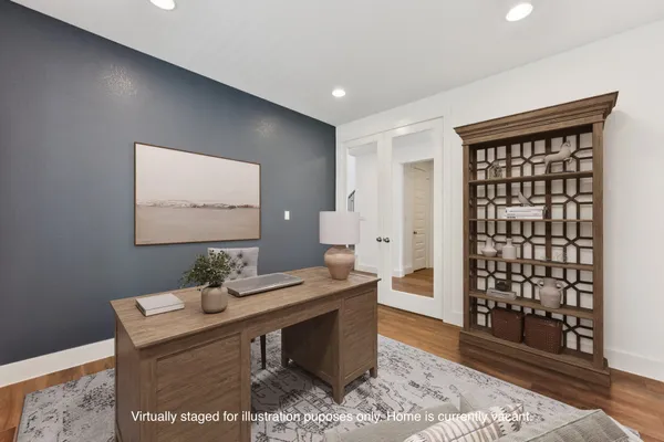 a view of an empty room and window