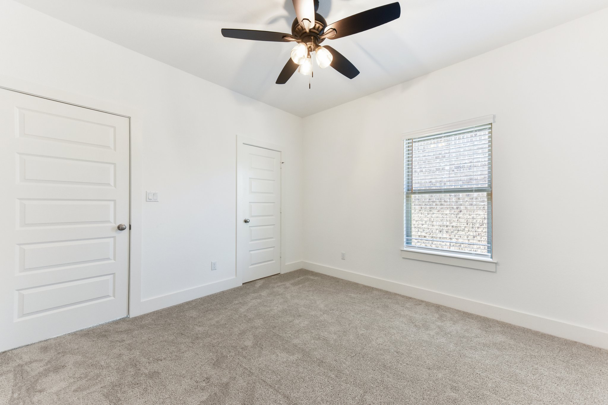 225 Ashmore Lane Georgetown, TX 78628 - Photo 25 of 36 Great size second bedroom with ceiling fan and large walk-in closet