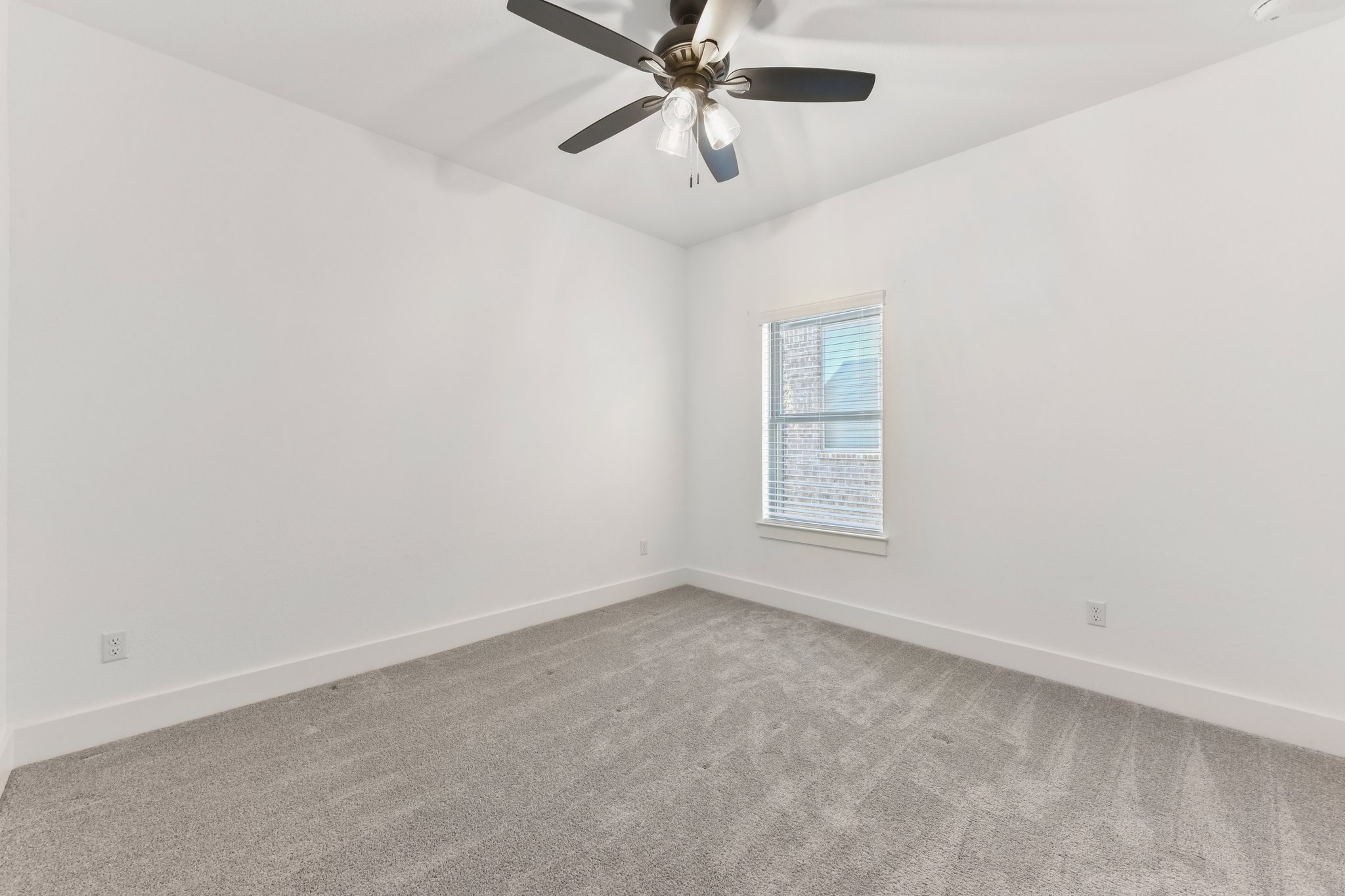 225 Ashmore Lane Georgetown, TX 78628 - Photo 26 of 36 The 4th bedroom is also a great size with celing fan and walk-in closet space