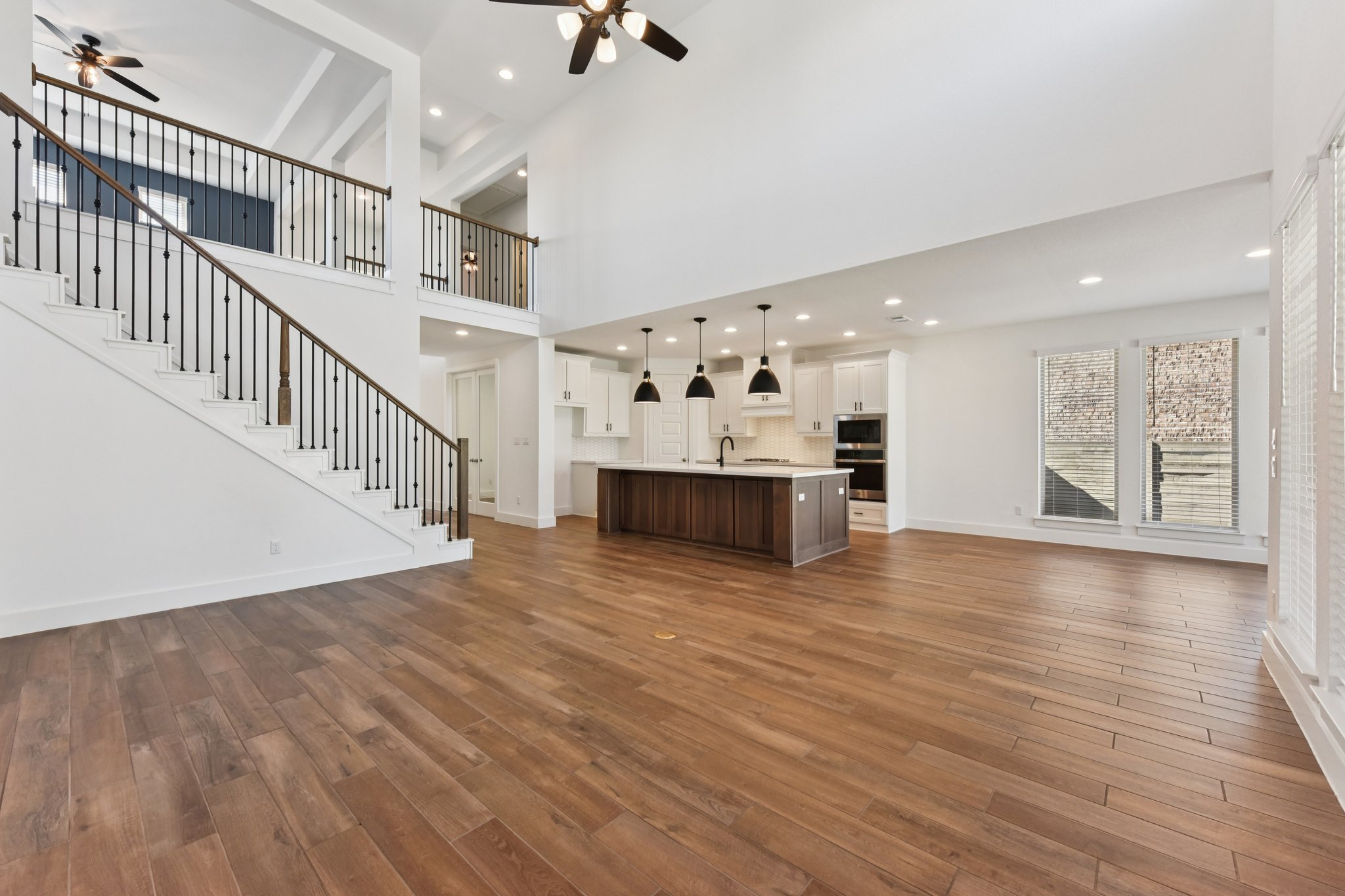 225 Ashmore Lane Georgetown, TX 78628 - Photo 36 of 36 Light and bright open floor plan. 2-story soaring ceilings in the living room.