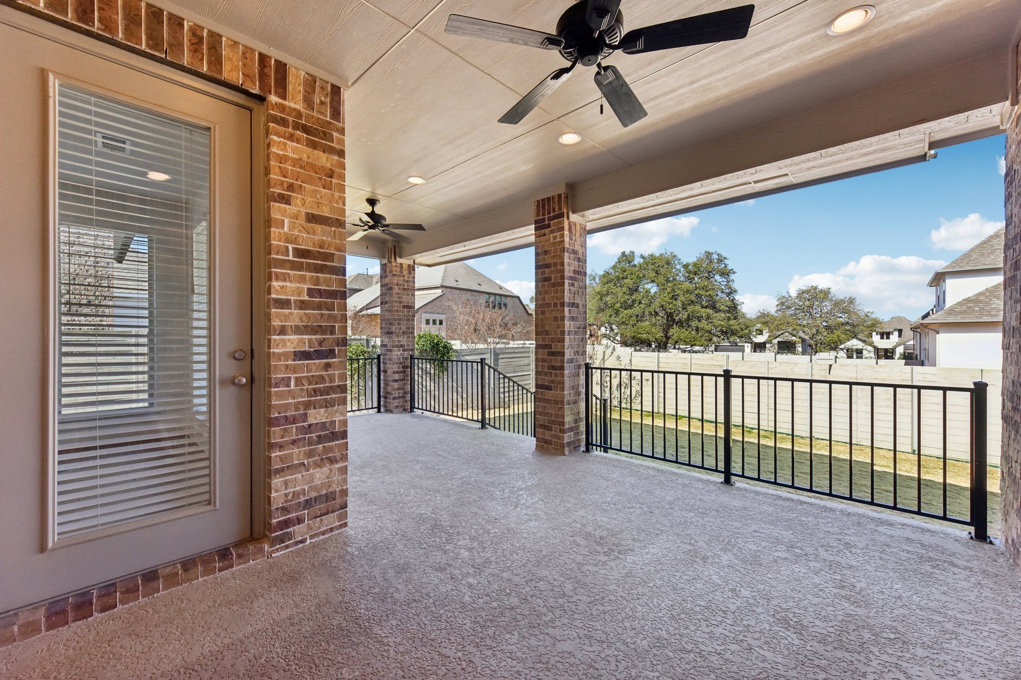 225 Ashmore Lane Georgetown, TX 78628 - Photo 30 of 36 Entertain with a barbque on the extended covered patio. Notice no home directly behind the patio view and the view of a large lush tree is so relaxing.