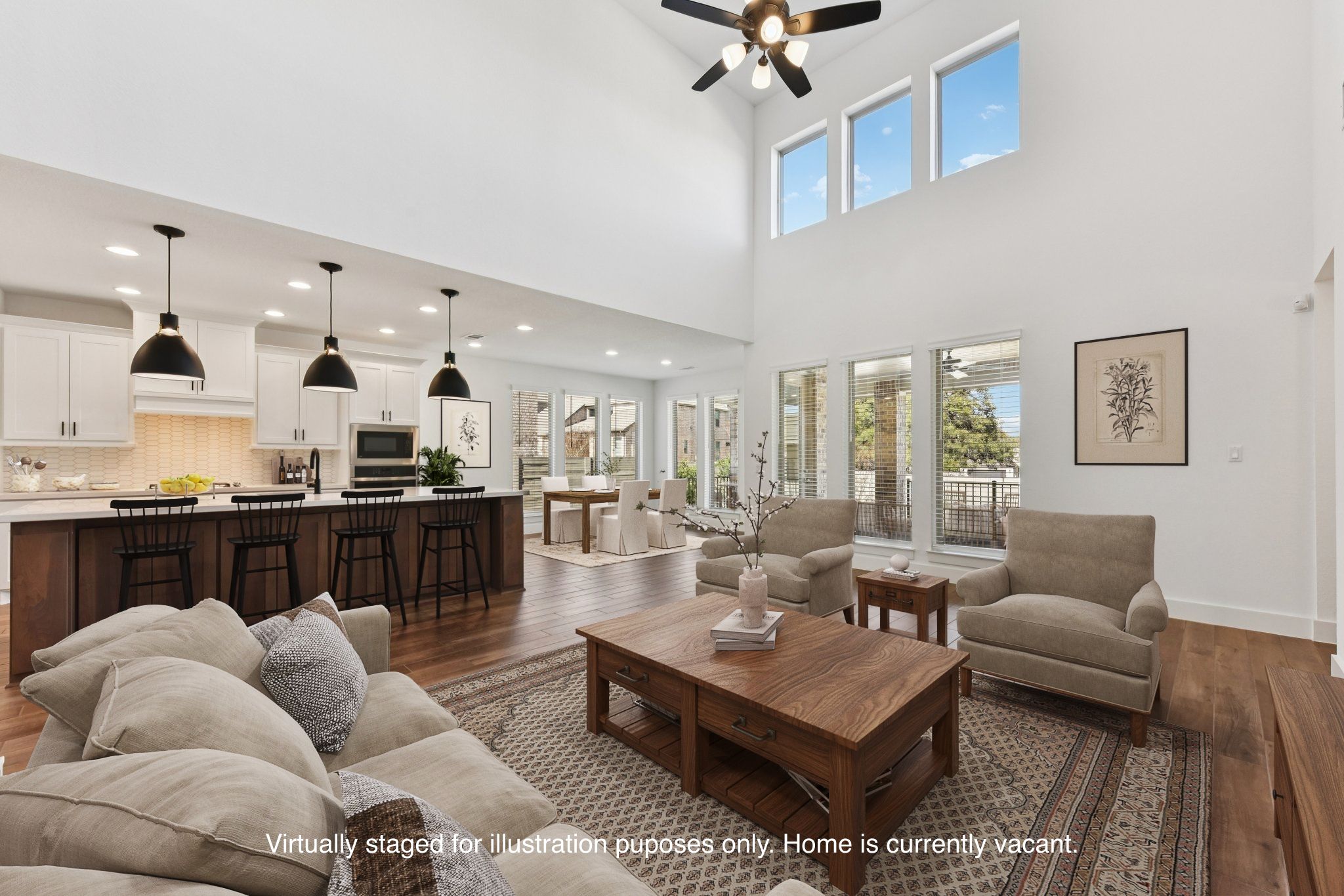 225 Ashmore Lane Georgetown, TX 78628 - Photo 2 of 36 Floor to ceiling windows provide an abundance of natural light. Gorgeous wood look tile floors for easy living for a busy family (Virtually staged for illustration purposes only)