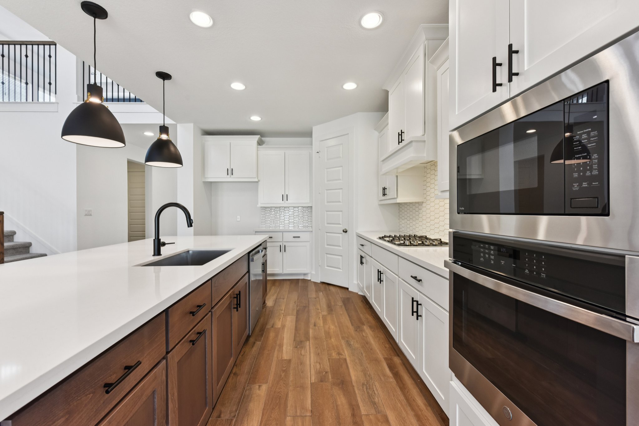 225 Ashmore Lane Georgetown, TX 78628 - Photo 6 of 36 Built in gas oven, microwave and gas cooktop that the chef of the family will love!