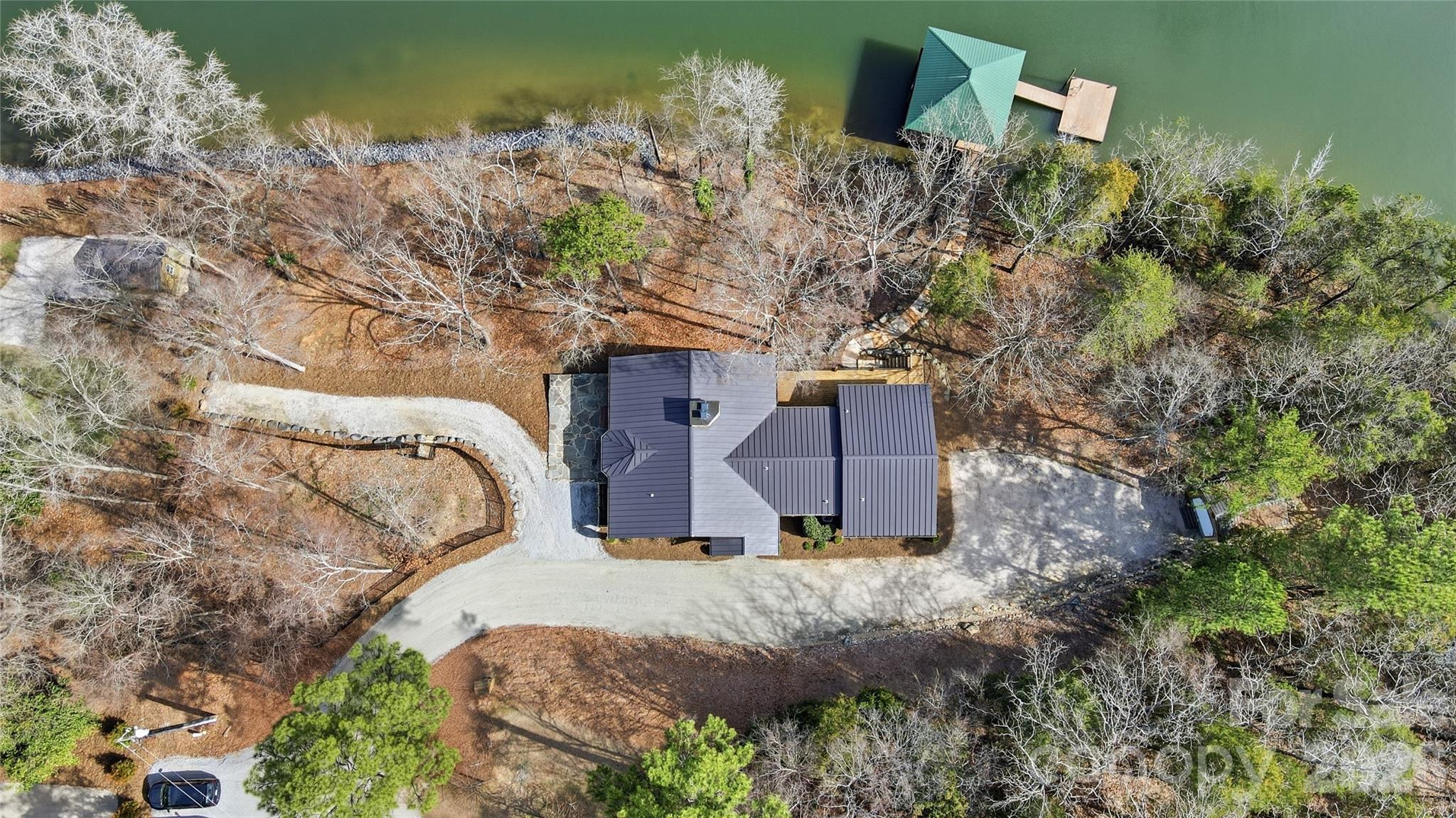 2295 Sussex Road York, SC 29745 - Photo 2 of 47 a front view of a house with a yard and large trees