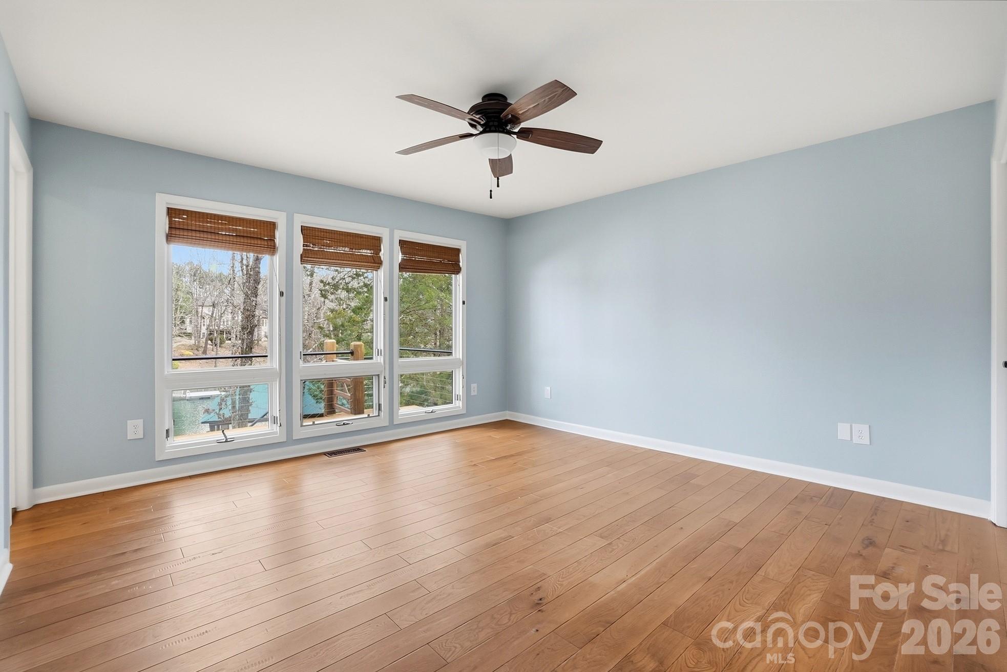 2295 Sussex Road York, SC 29745 - Photo 23 of 47 a view of an empty room with wooden floor and a window
