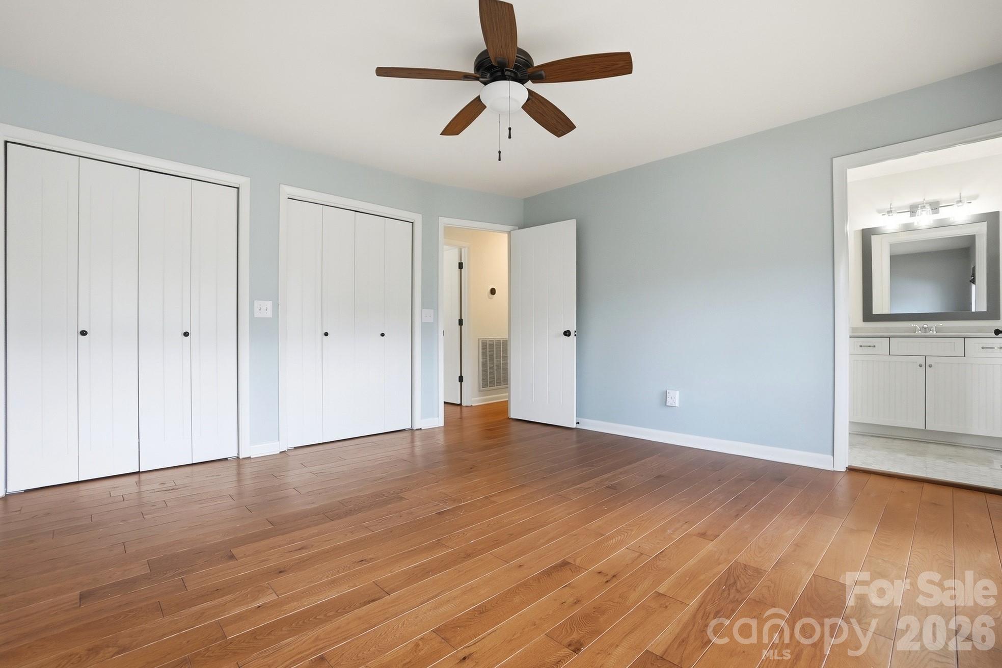 2295 Sussex Road York, SC 29745 - Photo 24 of 47 a view of empty room with wooden floor and ceiling fan