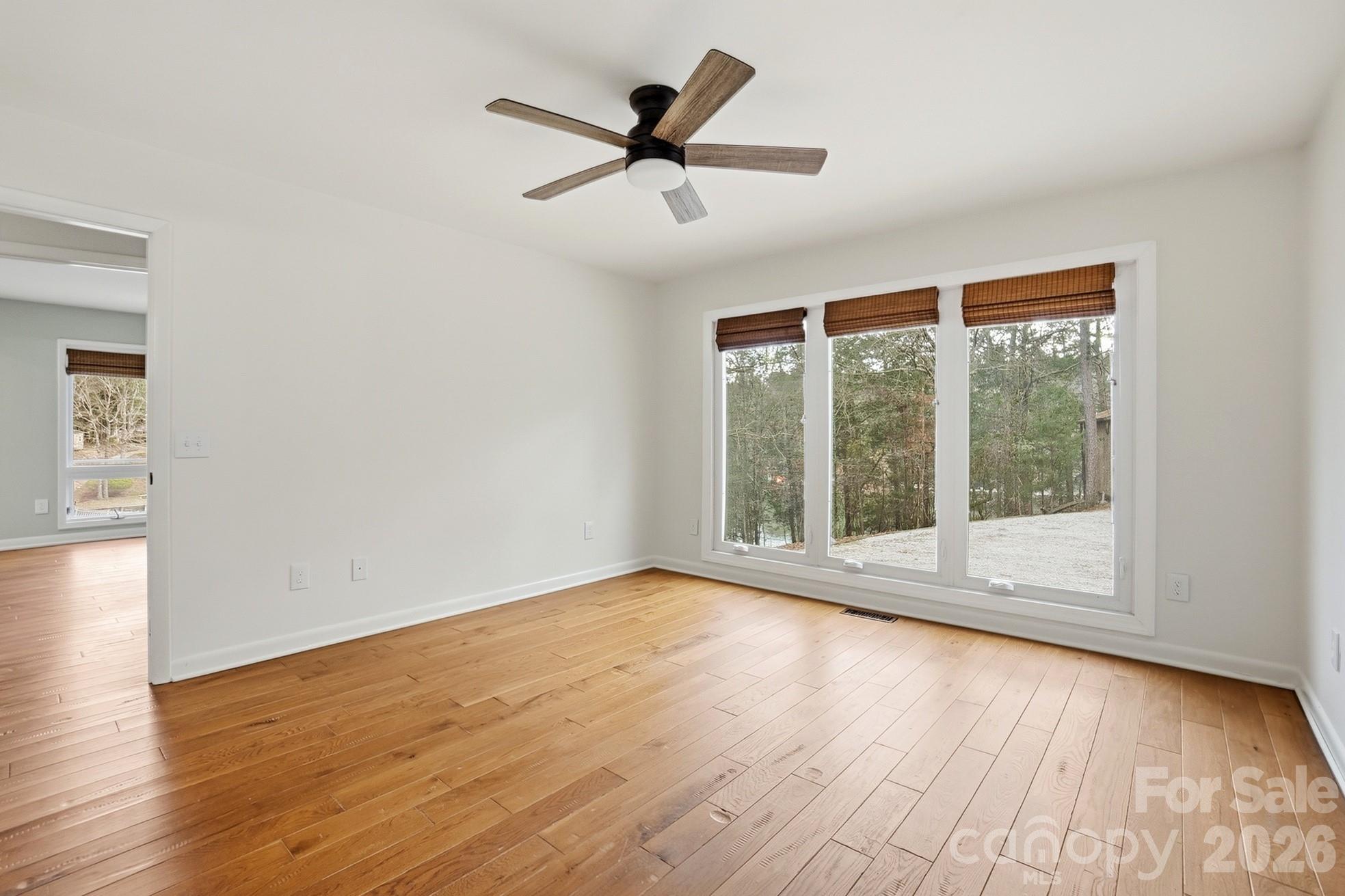 2295 Sussex Road York, SC 29745 - Photo 27 of 47 a view of empty room with wooden floor and fan