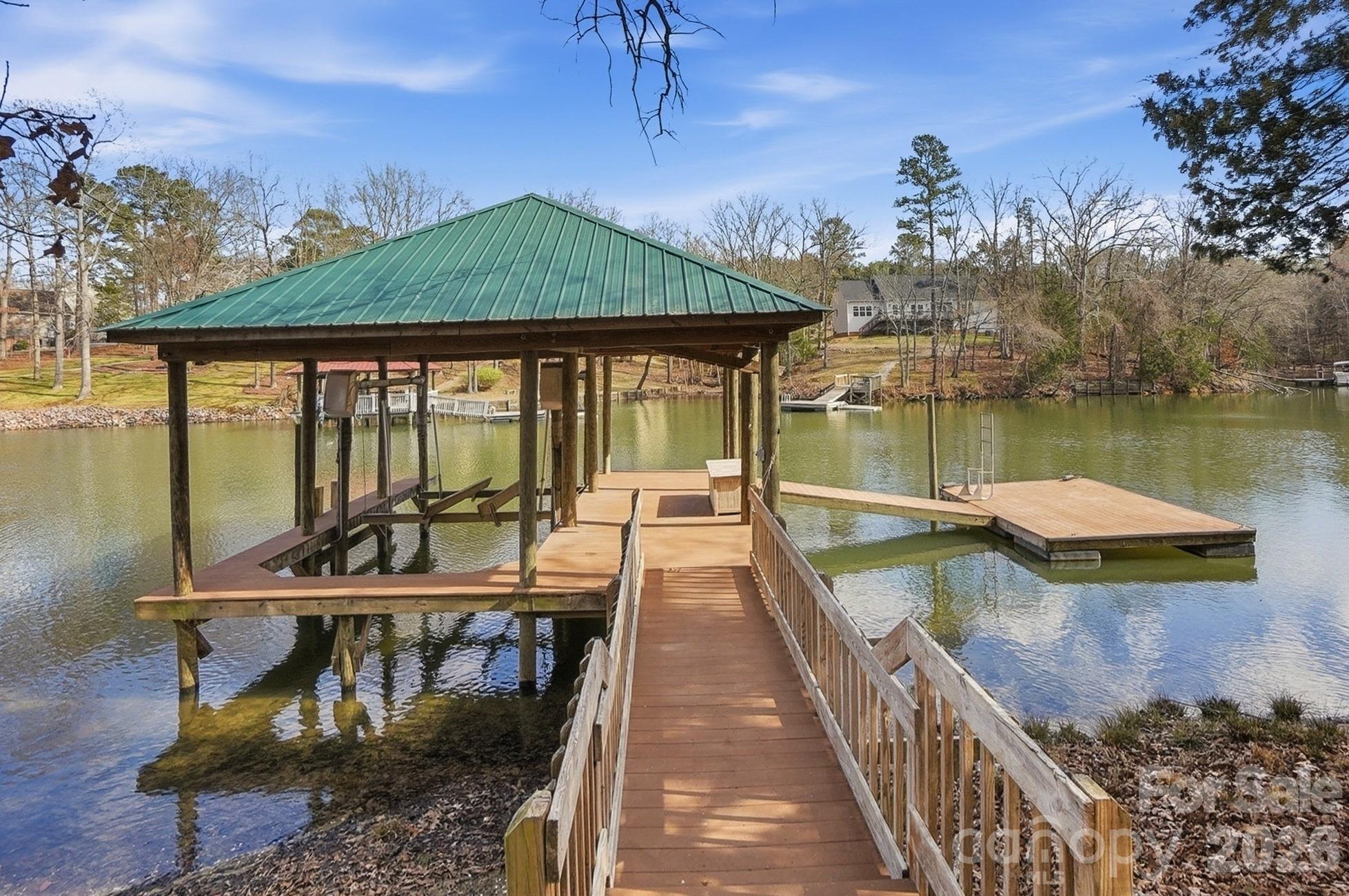 2295 Sussex Road York, SC 29745 - Photo 41 of 47 a view of a house with swimming pool and sitting area