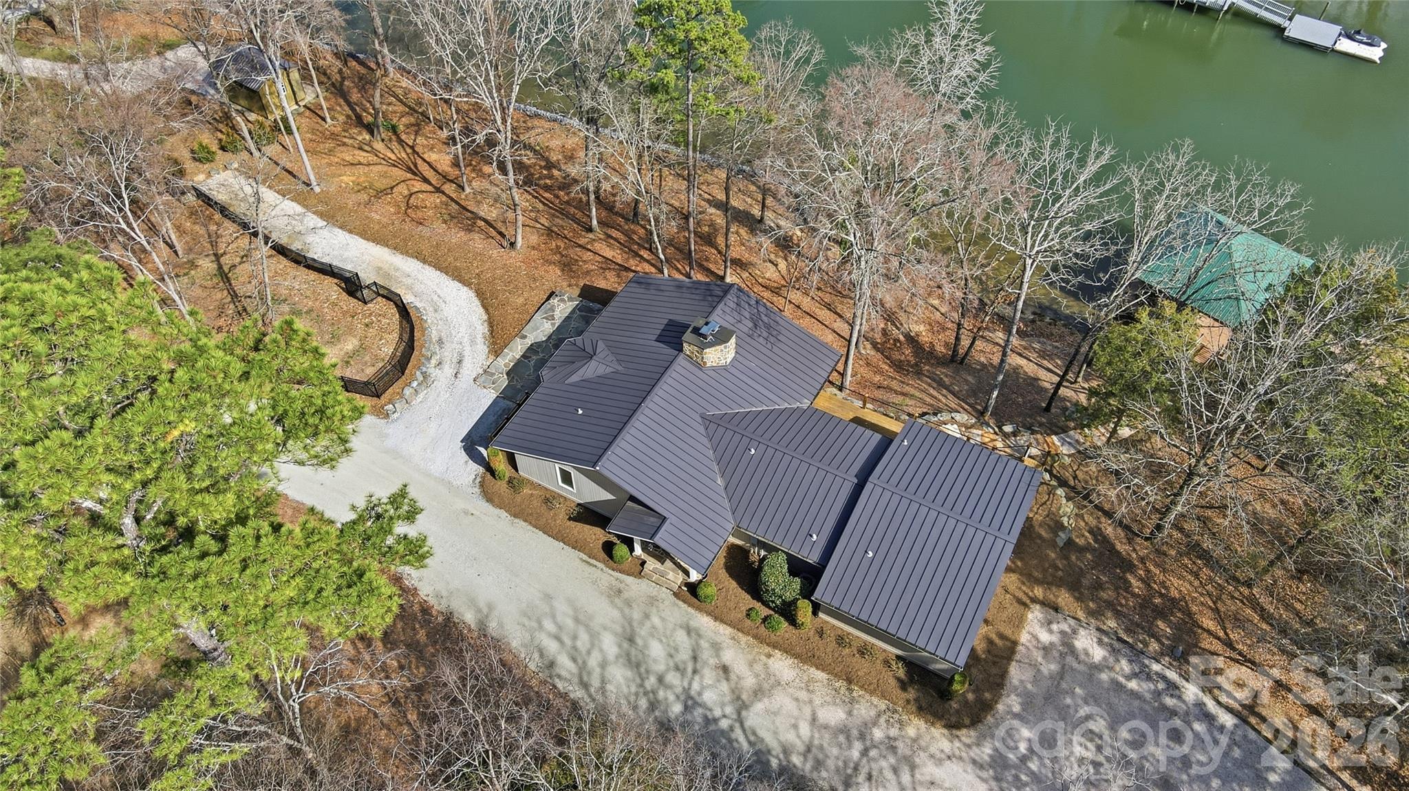 2295 Sussex Road York, SC 29745 - Photo 46 of 47 an aerial view of a house with a yard and lake view