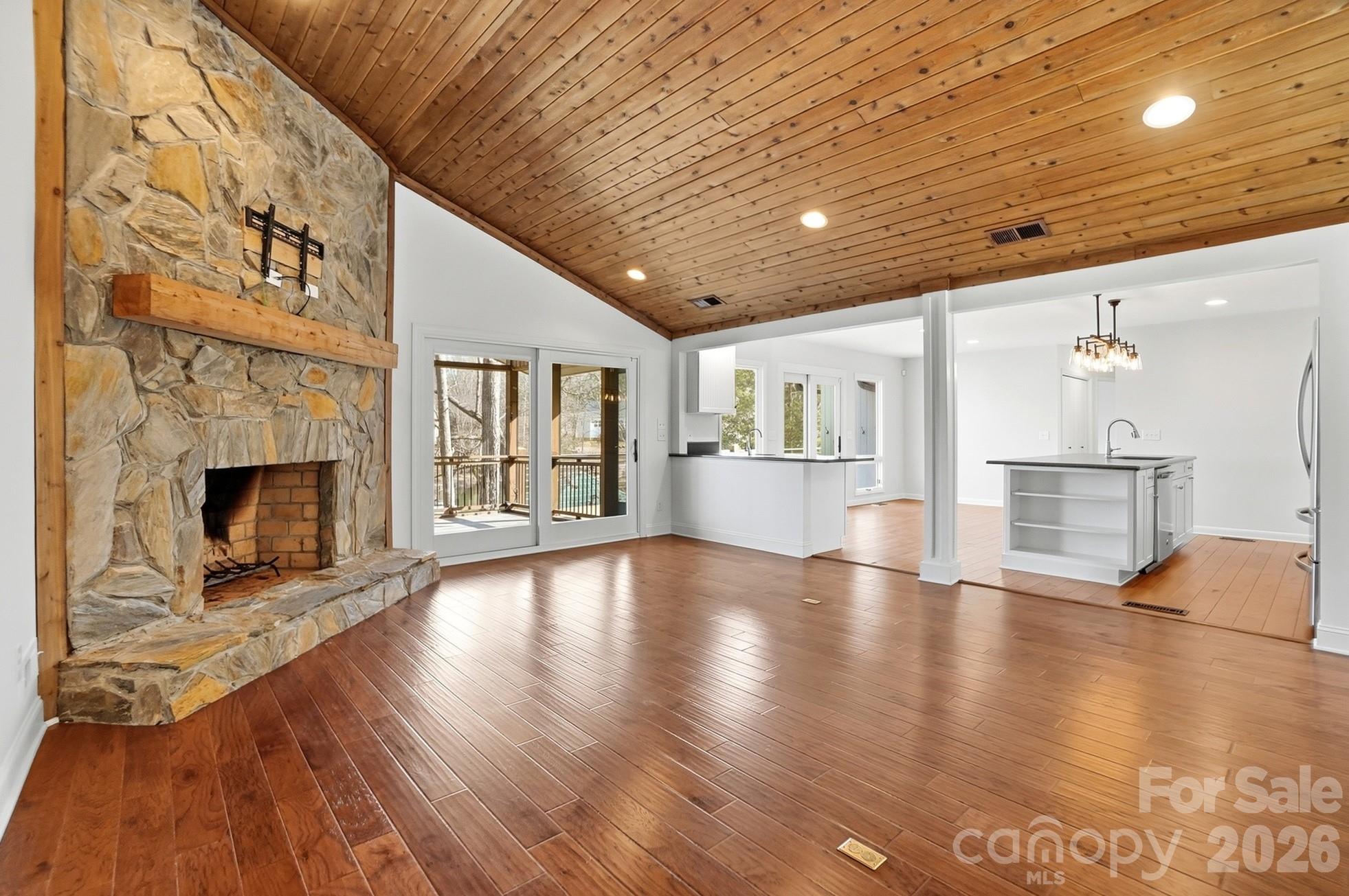 2295 Sussex Road York, SC 29745 - Photo 9 of 47 a view of empty room with wooden floor and fireplace