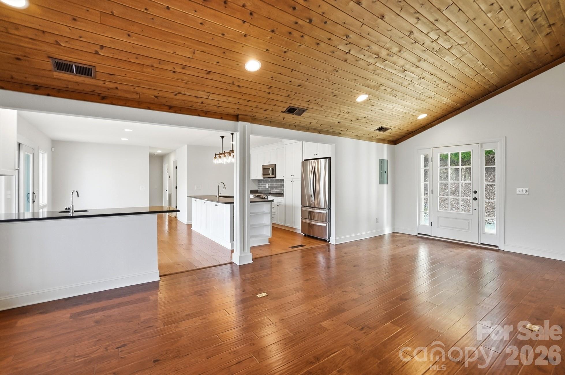 2295 Sussex Road York, SC 29745 - Photo 10 of 47 a view of an empty room with wooden floor