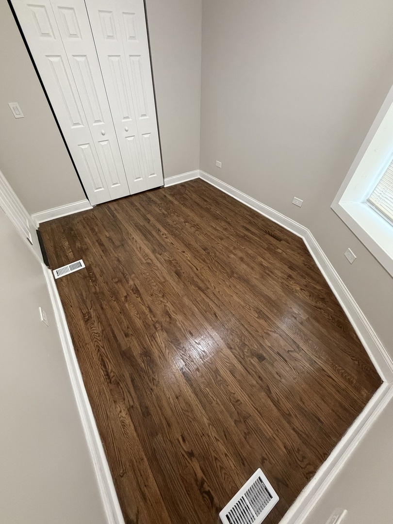 1048 West Marquette Road, Unit 1 Chicago, IL 60621 - Photo 6 of 13 a view of wooden floor