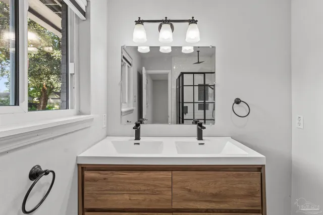a view of staircase with stainless steel appliances