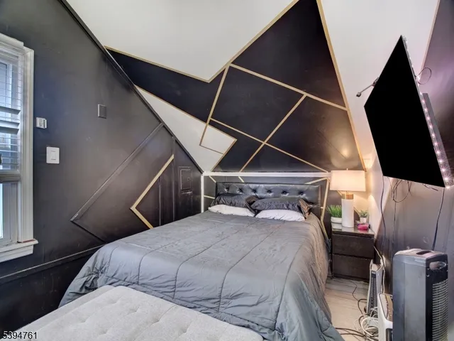 a view of a brick house with a yard