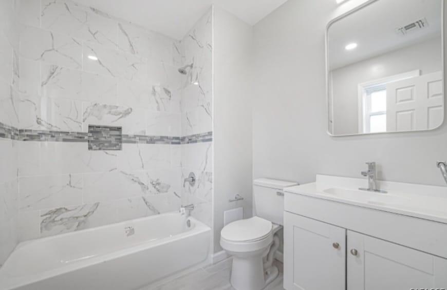 125 Birch Street, Unit 2 Bloomfield, NJ 07003 - Photo 11 of 11 a bathroom with a sink toilet and shower