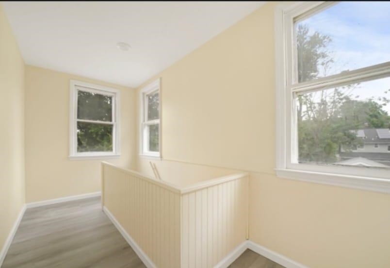 125 Birch Street, Unit 2 Bloomfield, NJ 07003 - Photo 4 of 11 a view of an empty room with a window