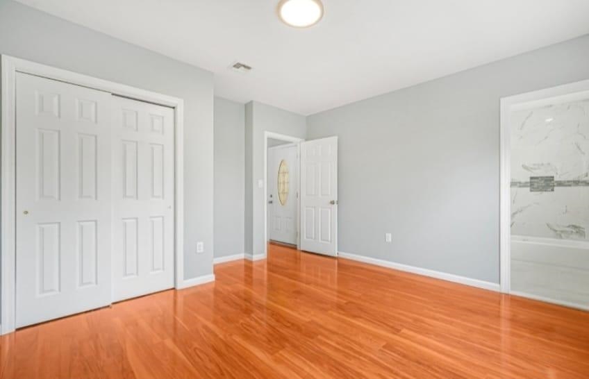 125 Birch Street, Unit 2 Bloomfield, NJ 07003 - Photo 8 of 11 a view of empty room with wooden floor