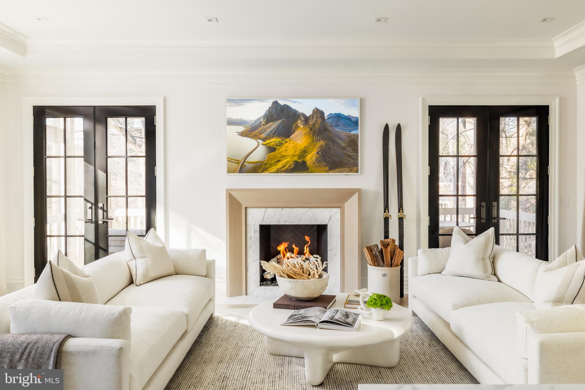 4939 Quebec Street Northwest Washington, DC 20016 - Photo 17 of 50 a living room with furniture and a fireplace