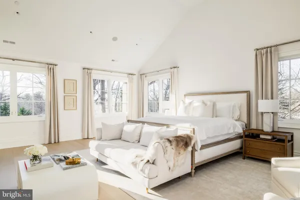 a kitchen with a sink cabinets and window