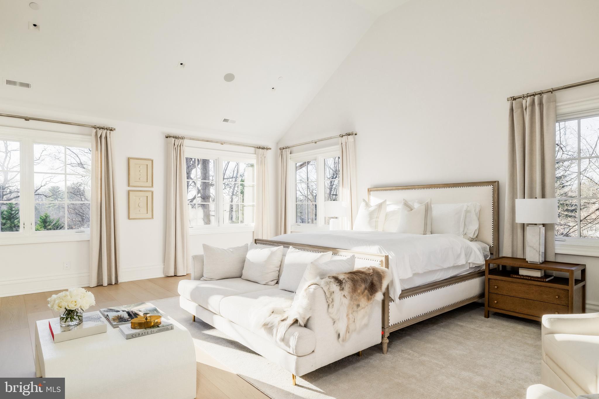 4939 Quebec Street Northwest Washington, DC 20016 - Photo 23 of 50 a bedroom with a bed couch and window