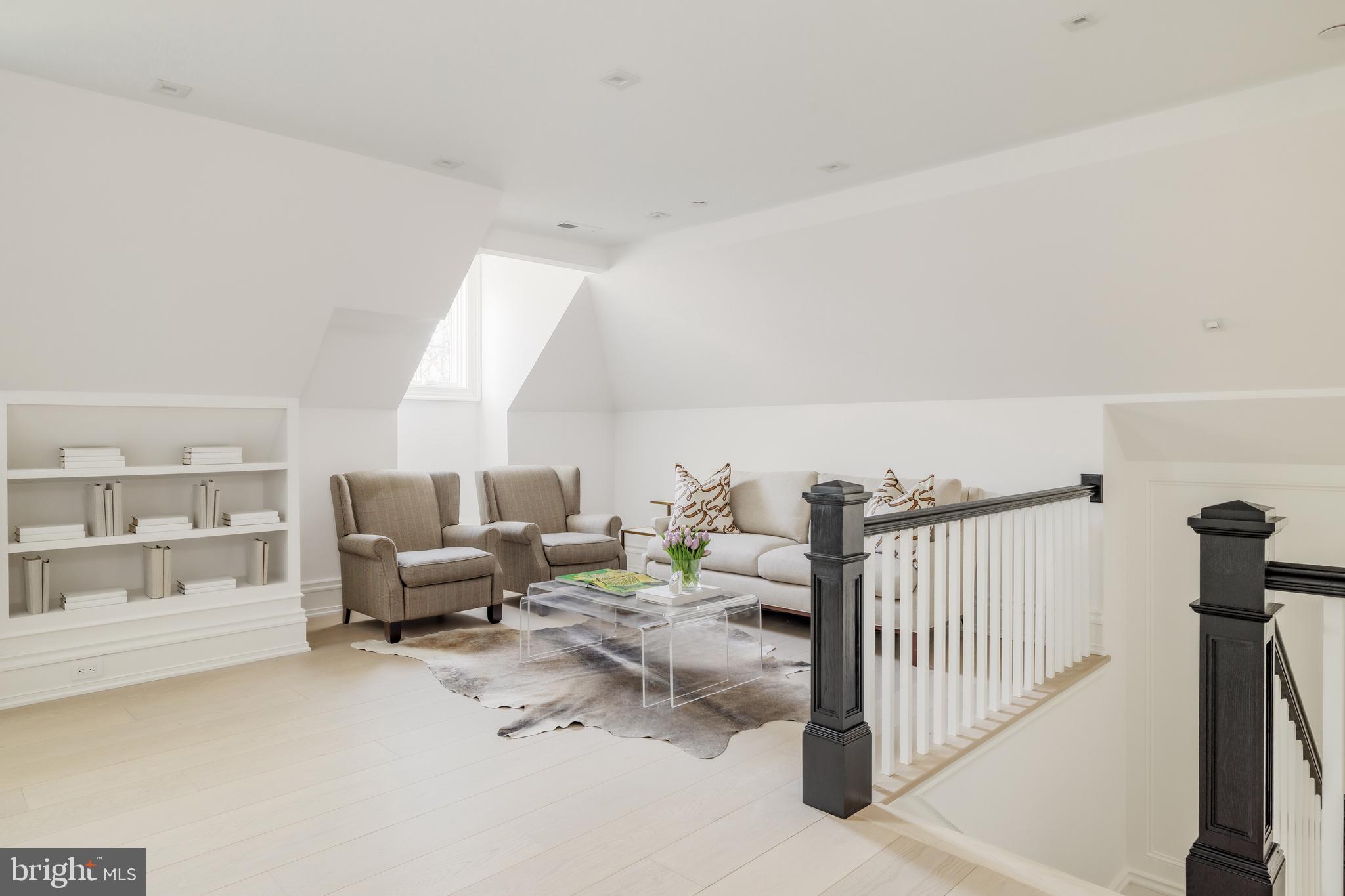4939 Quebec Street Northwest Washington, DC 20016 - Photo 36 of 50 a living room with furniture
