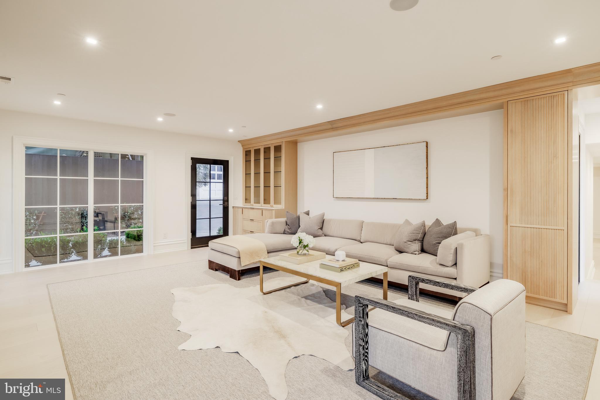 4939 Quebec Street Northwest Washington, DC 20016 - Photo 40 of 50 a living room with furniture and windows
